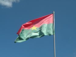 Burkina Faso's national flag raised in the air