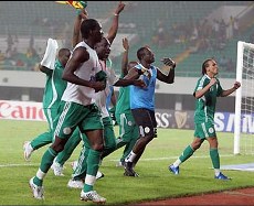 Nigeria's national football team players celebrate their passage into South Africa 2010