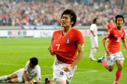 South Koreans playing against Iran in the 2010 FIFA World Cup qualifiers in the AFC zone. Korea Republic are now among hte 32 teams who will travel to South Africa in 2010 for the FIFA World Cup finals.