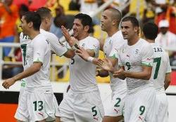 Algeria players celebrating the only goal of the game against Mali on match-day 2 of the tournament.