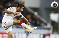 Tunisia's captain, Karim Haggui, clears the ball during his side's match against Gabon.