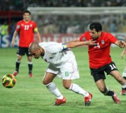 Egypt battling it out against Algeria in Khartoum during the 2010 World Cup play-off match.