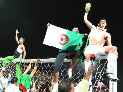 Algeria players celebrating their 2010 World Cup qualification in Khartoum, Sudan.
