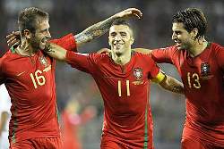Portugal's deputy captain Simao celebrates with his mates.