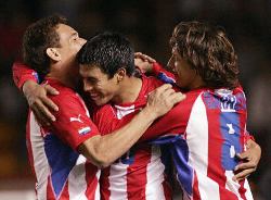 Paraguay's players celebrate together.