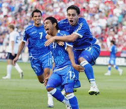 El Salvador's Castillo celebrates with the rest of his mates after putting his side in front against the United States of America in a World Cup qualifier in September 2009.