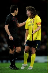 Carlos Puyol against Arsenal for Barcelona at the Emirates in the Champions League