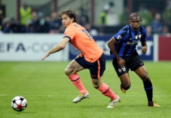 Barcelona's Maxwell against Samuel Eto'o in the Champions League game between Barcelona and Inter Milan