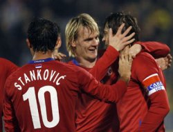 Serbia players celebrating a 2010 World Cup qualification goal.