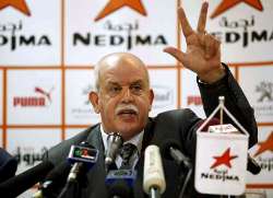 Algeria's coach, Rabah Saadane, speaking during a press conference.