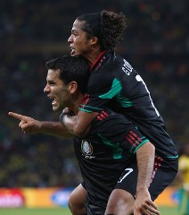 Marquez celebrates with Dos Santos