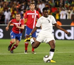 Gyan takes the penalty against Serbia.