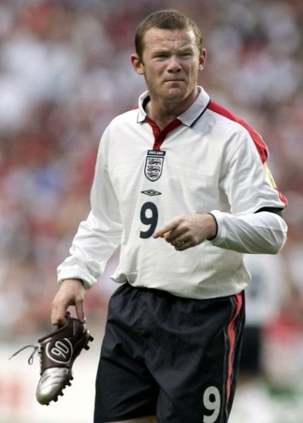 England striker Wayne Rooney needs to get his scoring boots
on