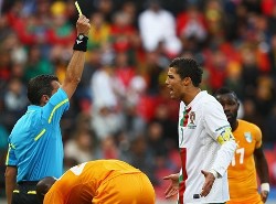 Cristiano Ronaldo being showed the yellow card.