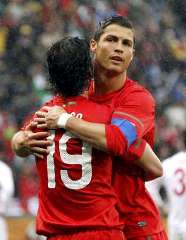 Portugal's Cristiano Ronaldo celebrates his first goal
since 2008 with Tiago.
