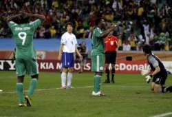 Nigerian players react following a wasted opportunity.