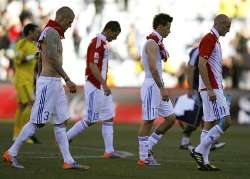 2010 World Cup: Slovakia players leave the pitch downhearted after losing 2-0 to Paraguay on Match-day Two.