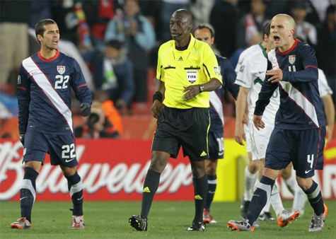 Referee Koman Coulibaly gets an earful after disallowing a US goal against Slovenia