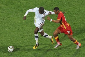 USA's Jozy Altidore escapes from Andre Dede Ayew