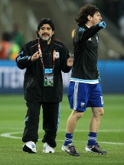 Argentina's Diego Maradona applauds Lionel Messi as the player
celebrates Argentina's victory over Mexico.