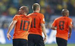 Wesley Sneijder and Arjen Robben celebrate as the Netherlands
beat Brazil.
