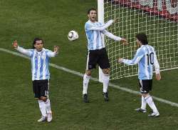 Argentina players react in disappointment.