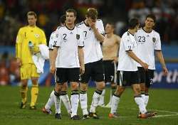 Germany players looking dejected as they lose 1-0 against Spain in the semi-finals of the 2010 FIFA World Cup.