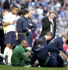 Tottenham Coach Harry Redknapp giving instructions to his players.