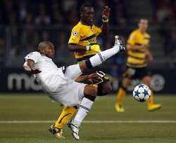 UEFA Champions League play-off match: Tottenham Hotspur vs Young Boys in action.