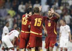 Euro 2012 Qualifying: Montenegro players celebrate against Wales