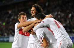 Euro 2012 Qualifying: Turkey players celebrate past Kazakhstan.