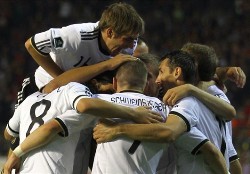 Euro 2012 Qualifying: Germany players celebrate Klose's lone goal against Belgium.