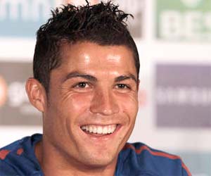 Ronaldo is all smiles at the Obidos team press conference.