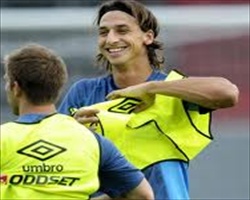 Sweden's Zlatan Ibrahimovic training with a mate. He is expected to perform outstandingly in the UEFA Euro 2012 Qualifying