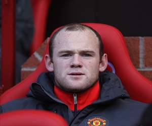 Manchester United's Wayne Rooney tells his manager Sir Alex Ferguson that he wants to leave the Manchester United club