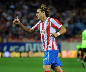 Diego Forlan has been tipped by Atletico Madrid coach Quique Sanchez Flores to score a hat-trick against Real Madrid.