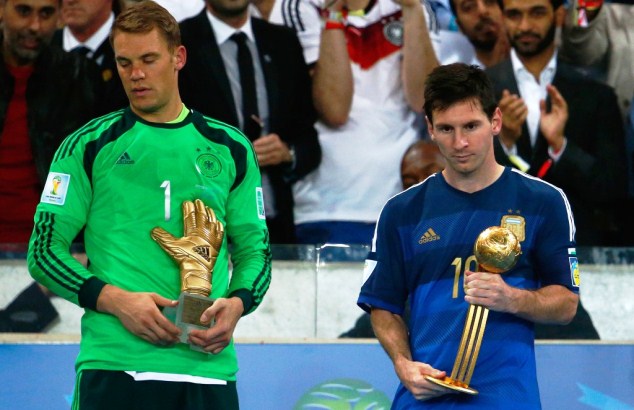 Lionel Messi posing with the Adidas Golden Ball after Argentina's loss to Germany in the World Cup 2014 Final.