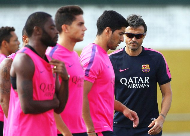 With coach Luis Enrique - Luis Suarez's Barcelona training.