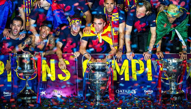 Barcelona's squad on their treble-winning parade