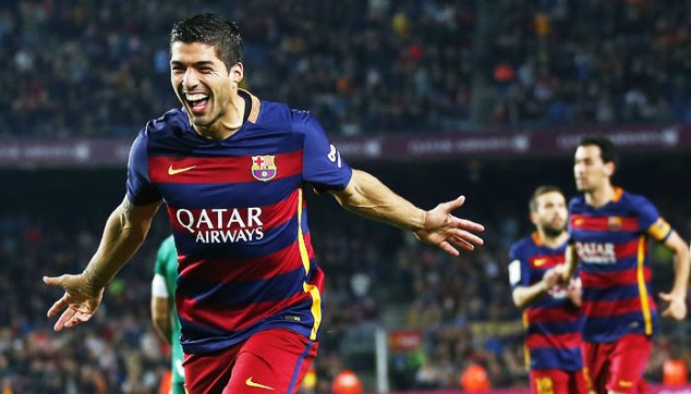Luis Suarez celebrates his hattrick for Barcelona 