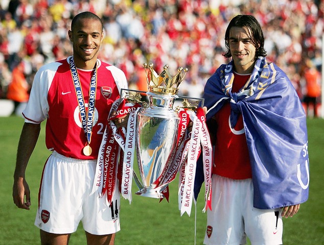 Former Arsenal players Thierry Henry and Robert Pires 