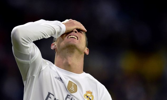 Real Madrid's Cristiano Ronaldo reacts after an embarrassing defeat to their rivals Barcelona in El Clasico 