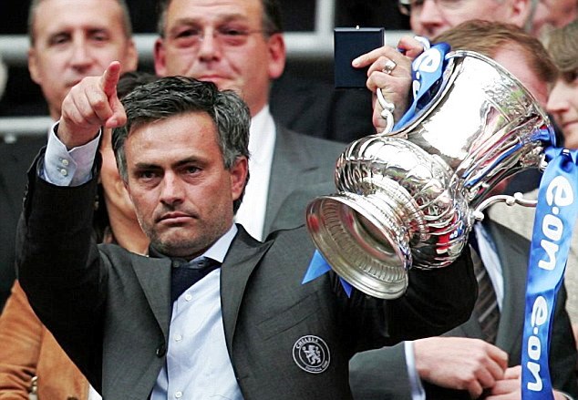 Jose Mourinho lifts the FA Cup as Chelsea manager 