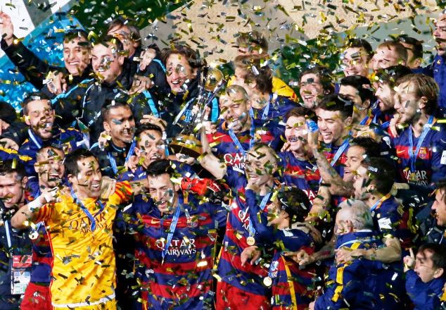 Barcelona players celebrate after winning the FIFA World Club Cup 