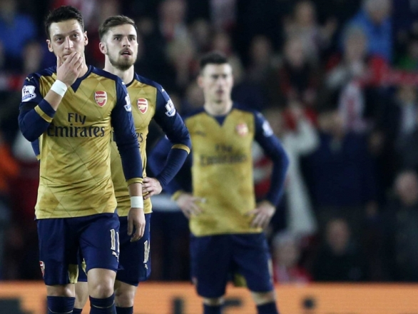 Mesuit Ozil, Aaron Ramsey and co looking dejected after 4-0 loss to Southampton