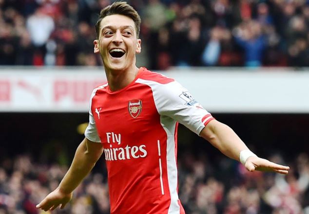 Arsenal's Mesut Ozil celebrates one of his goals for the club