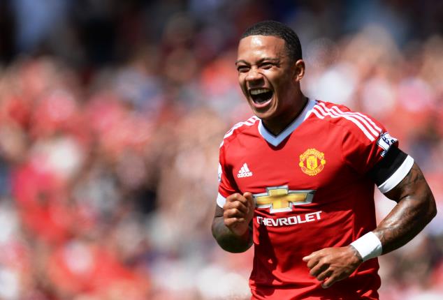 Memphis Depay celebrates one of his goals for Man United