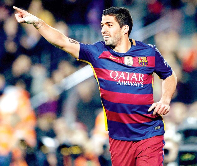 Suarez celebrates one of his goals for Barcelona