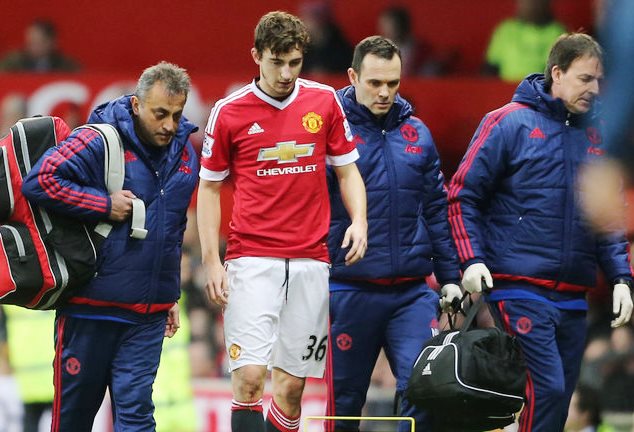 Matteo Darmian is helped out of the pitch after suffering a rib injury against Southampton 