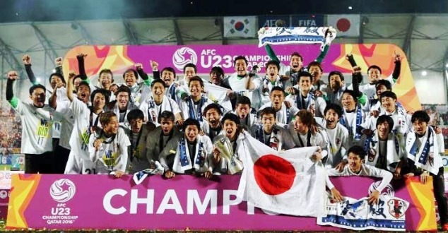 Japan players celebrate winning the Asian U-23 Champions finals against South Korea 